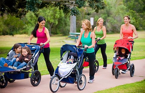 1338354595_getty_rm_photo_of_women_pushing_strollers_on_walk