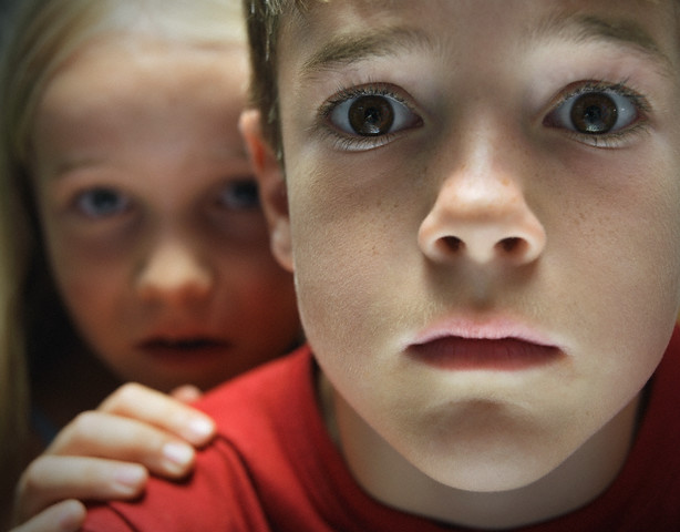 Boy in Front of Girl